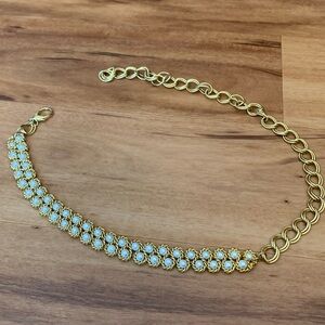 Elegant Gold and White Bracelet